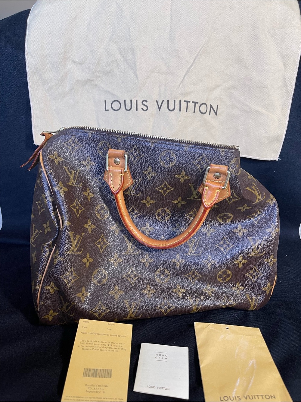 Louis Vuitton Monogram Canvas Speedy with Tan Leather Handles